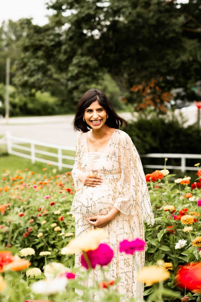 Expecting mother photographed among spring blossoms in Hamilton
